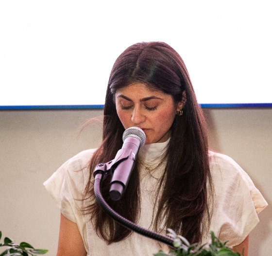 Olivia Cohen addresses the audience