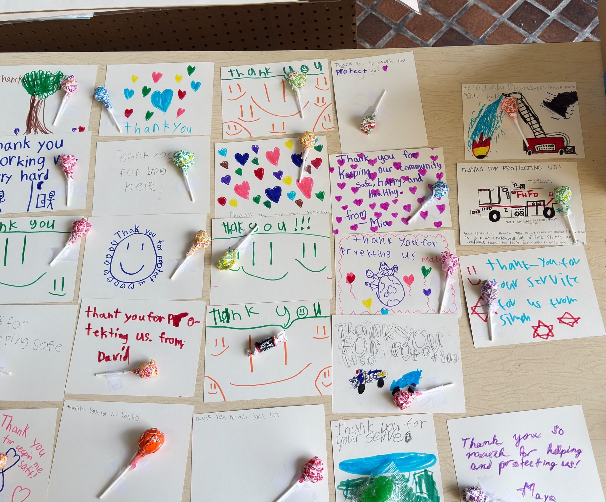 Adat Shalom synagogue students created 'thank you' cards for their local security team and first responders Display of thank you cards by Adat Shalom synagogue students