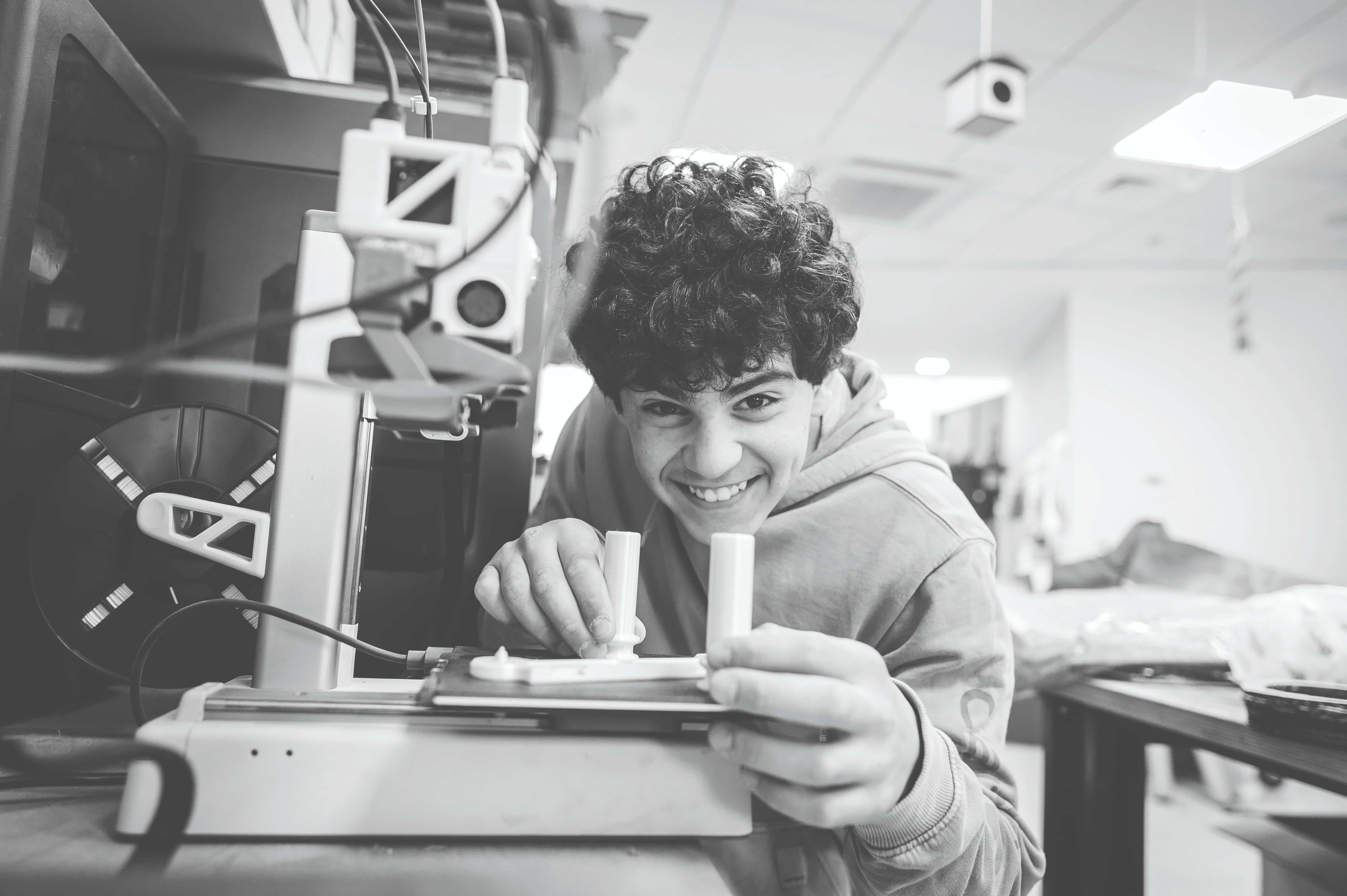 Ben works on a hands-on technology project in the Maker Space program, one of GrooveTech’s most popular tracks (Photo by Ron Rahamim)