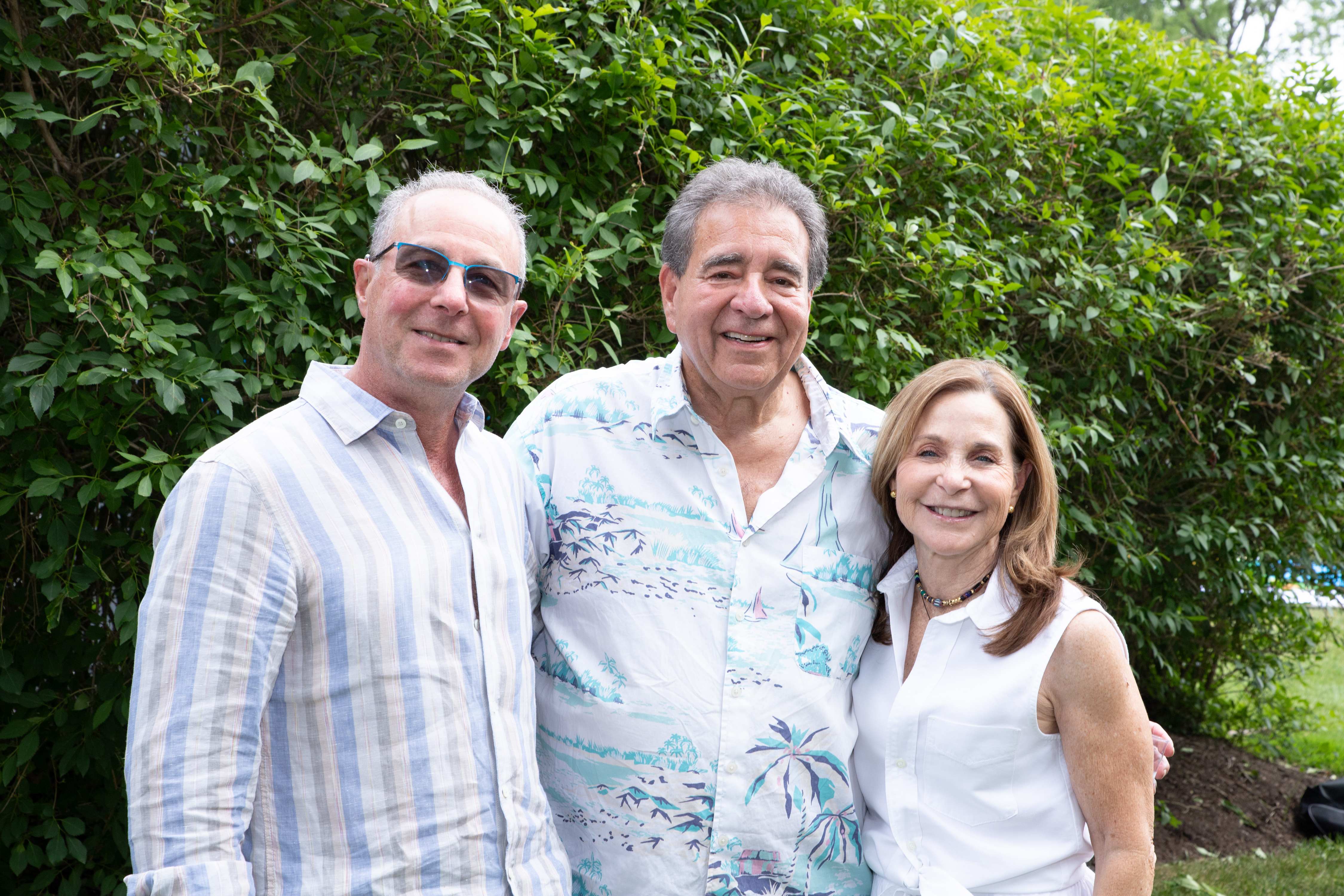 Three Jewish National Fund-USA supporters pose outdoors during the Livingston Tzofim Friendship Caravan event.