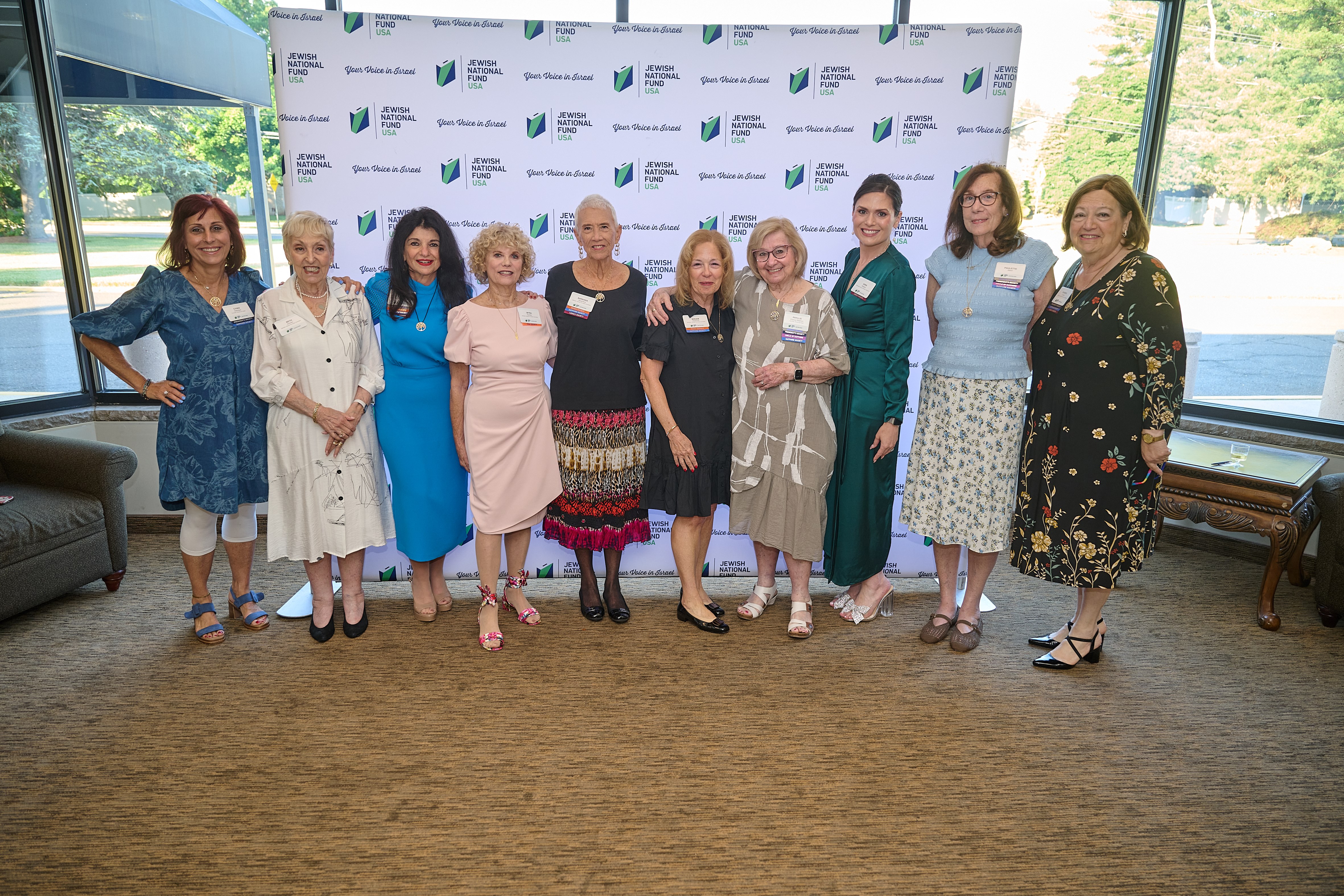 A group of event attendees from left to right: Cyndi Kleinbart, Beth Krinsky, Anne Kroll, Myra Epstein, Barbara Rosenthal, Miriam Waldman, Phyllis Solomon, Anna Millstein, Paulette Albert, Barbra London