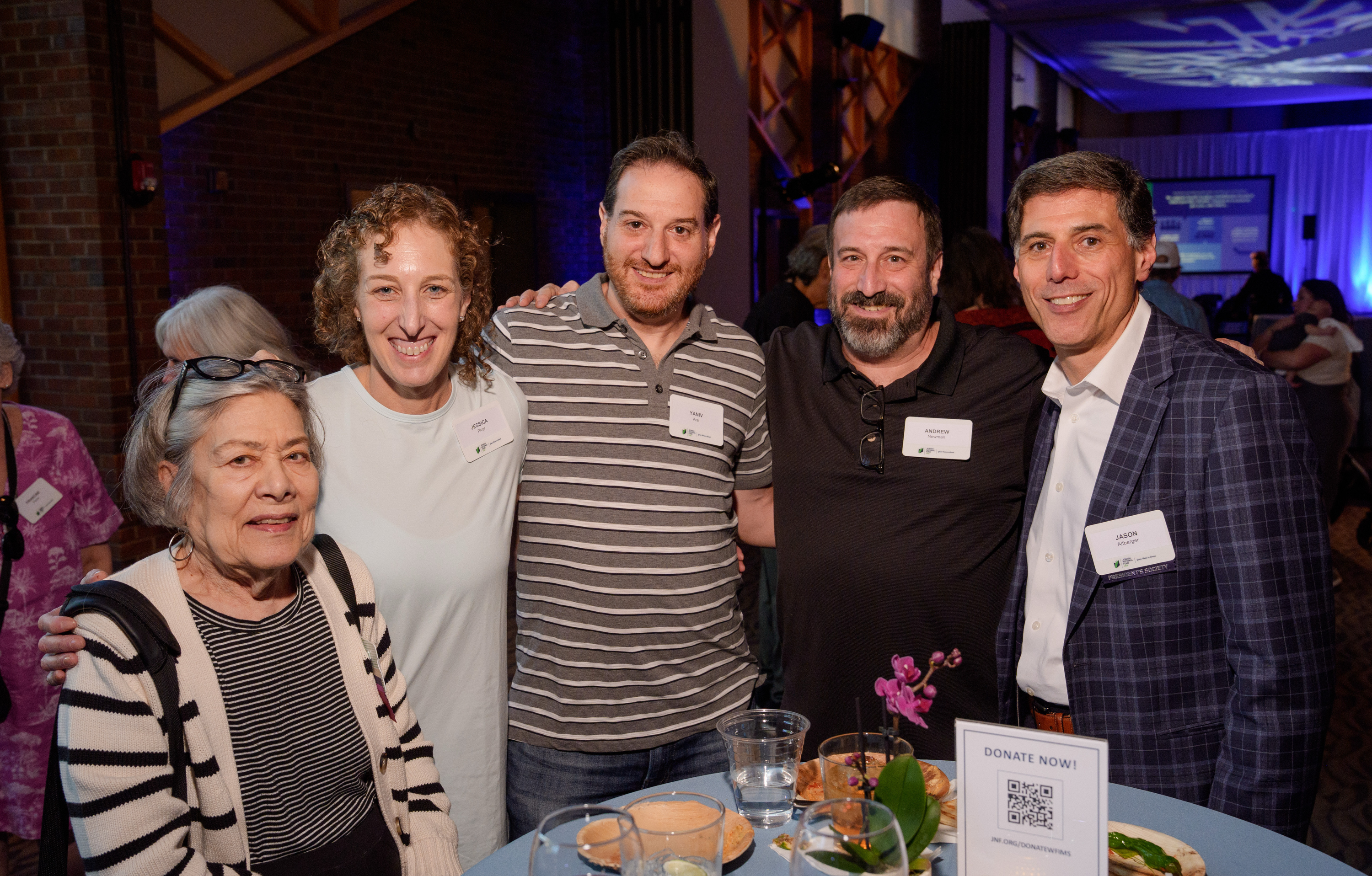 A group of event attendees from left to right:  Nancy Siegel, Jessica Pivar, Yaniv Arai, Andrew Newman, and Jason Altberger