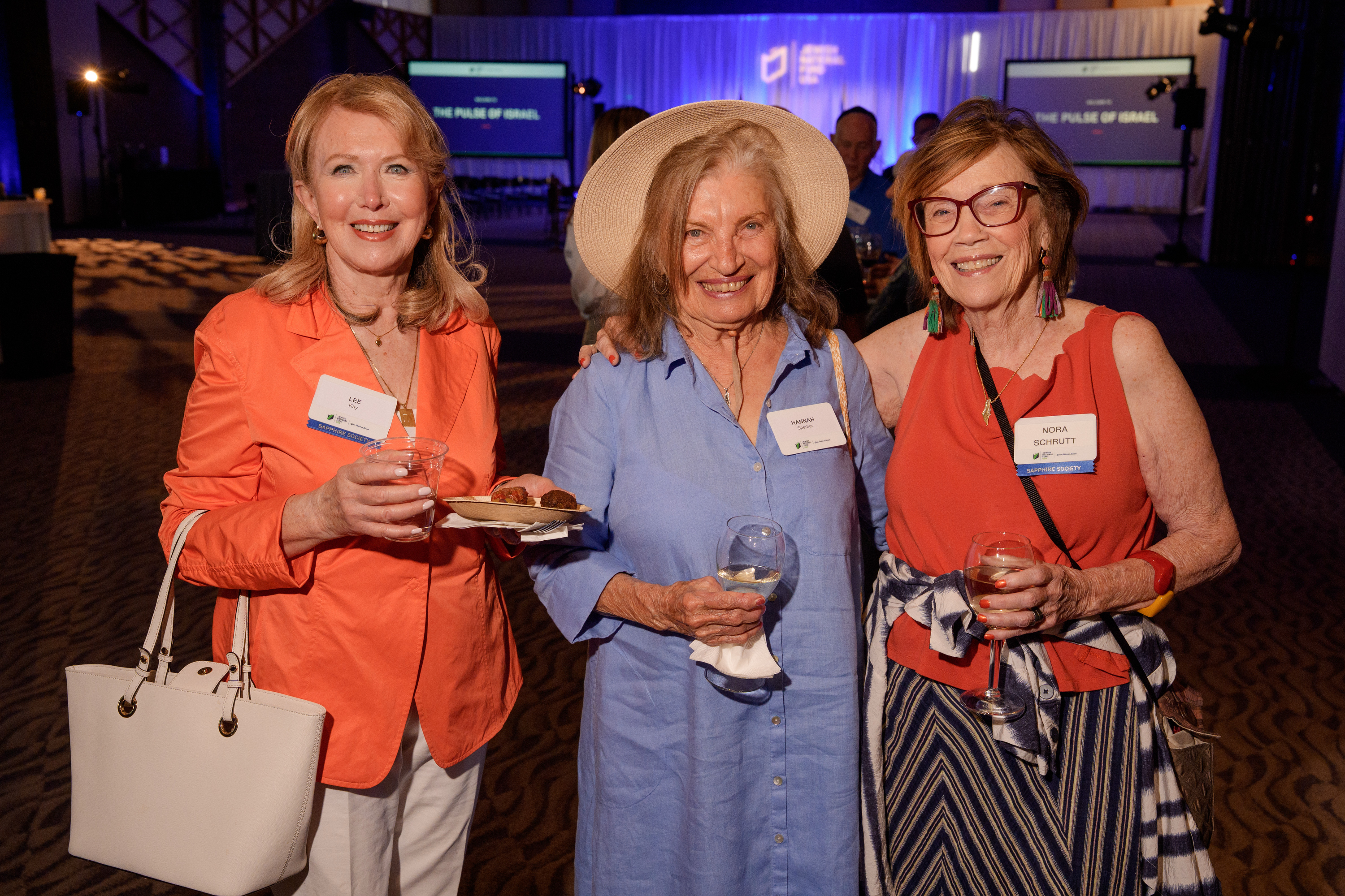 A group of event attendees from left to right:  Lee Kay, Hannah Sperber, and Board of Trustees member Nora Schrutt   