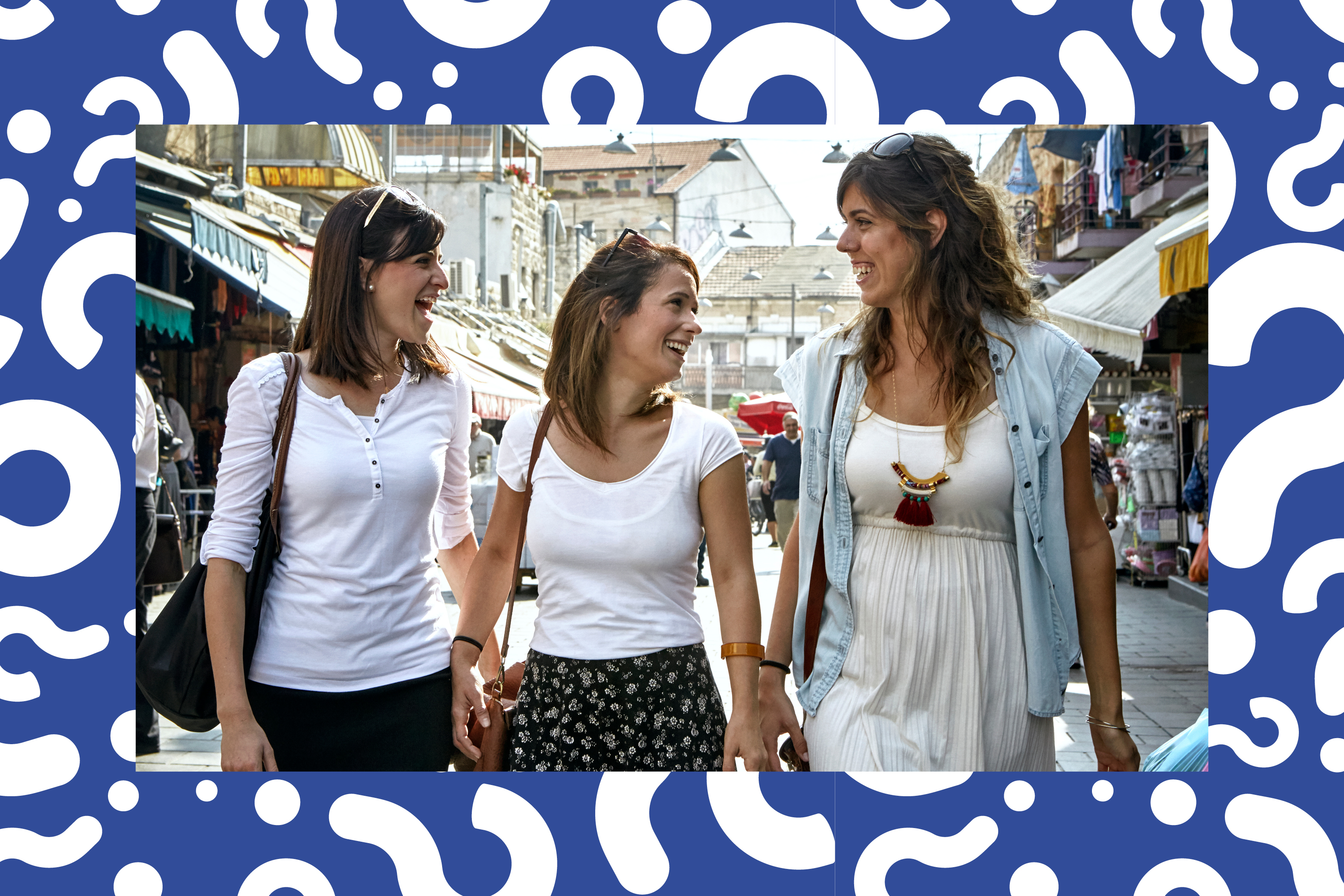 Women laughing in the market