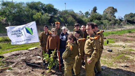 JNF planting trees with Special in Uniform