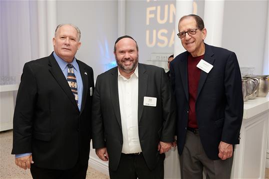Stephen Greenberger, Rabbi Yosef Weinstock, and Harold Zomek