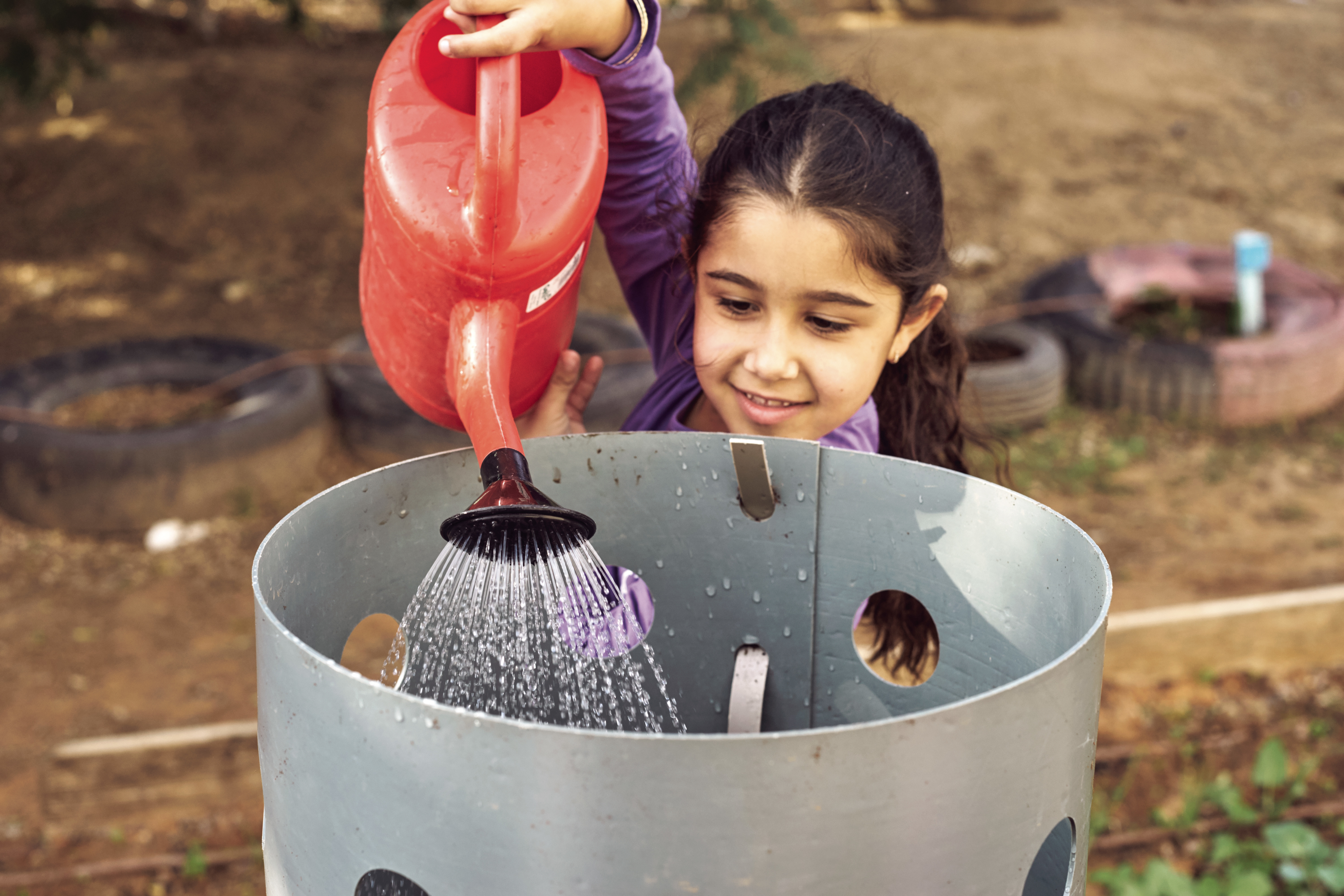 Girl with water pitcher